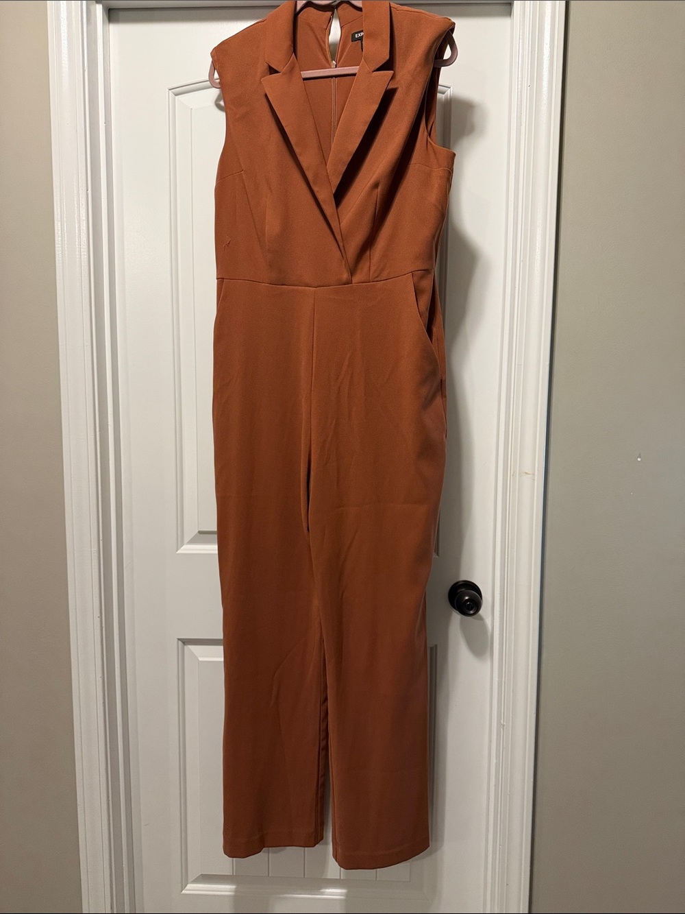 Express Sleeveless Rust-Orange Jumpsuit with Notch Lapel